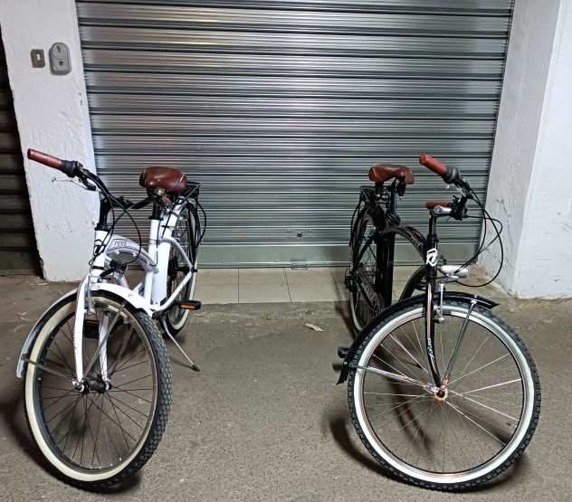 2 biciclette uomo e donna da vetrina - giugno 2023