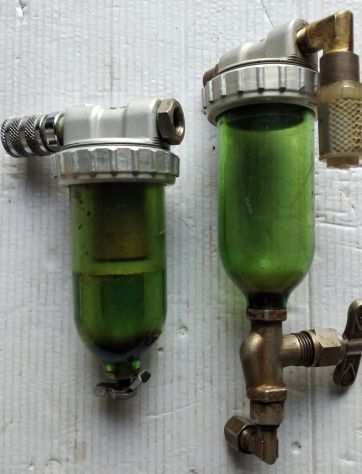 2 componenti di antico compressore meccanico
