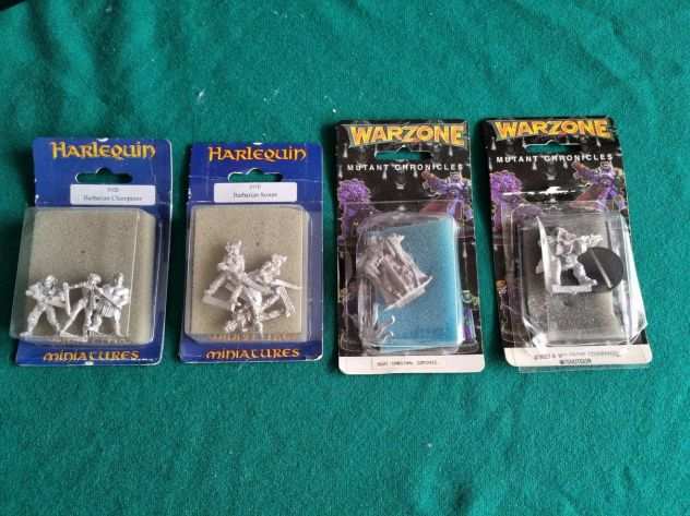 4 blister di miniature anni 90 2 Warzone e 2 Harlequin