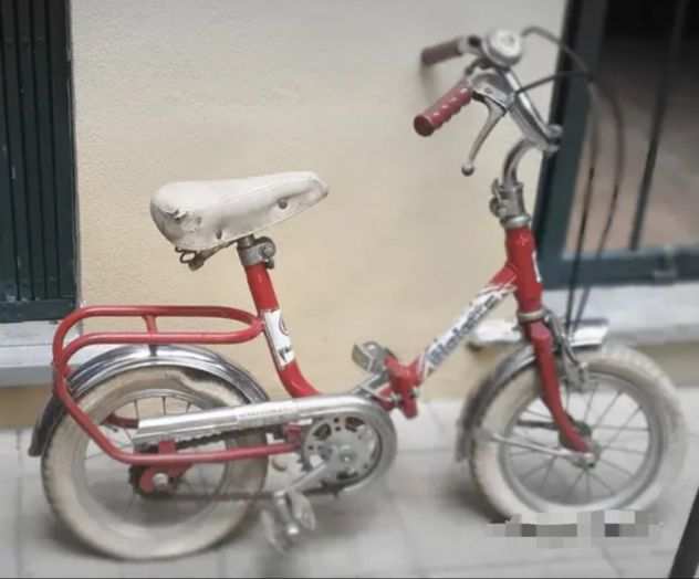 Bici vintage bimbo ideale vetrine negozi