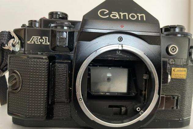 Canon A-1  FD 1.850mm  Vivitar 2,828mm  acc.  Fotocamera reflex a obiettivo singolo (SLR)