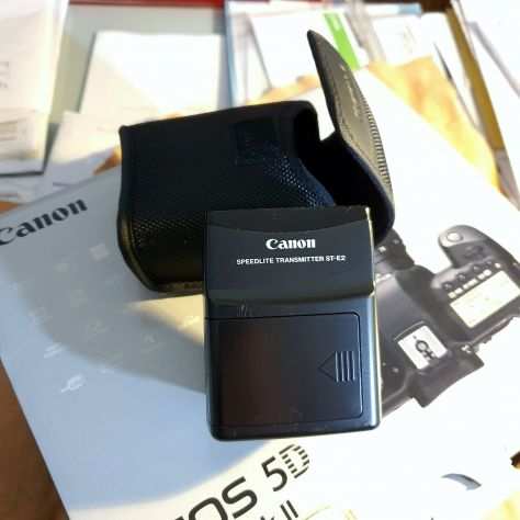 Canon Speedlite Trasmitter ST-E2  cavo accessori OC-E3  accumulatori e caricab