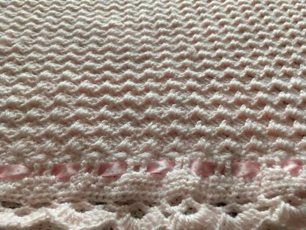 Copertina di lana rosa.
