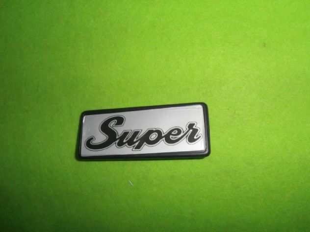 Fiat 127 Super logo mascherina anteriore NUOVO