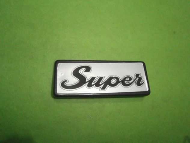 Fiat 127 Super logo mascherina anteriore NUOVO