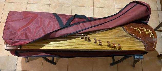 Guzheng - - Strumenti musicali - Cina