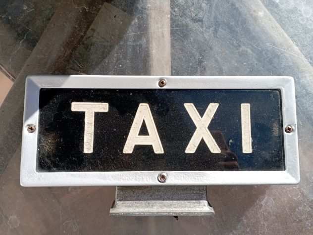 Insegna taxi depoca