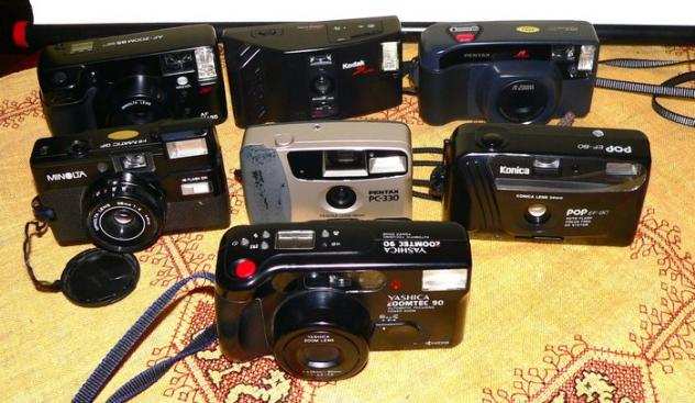 Konica, Minolta, Yashica, Pentax varie 7 camera compact..