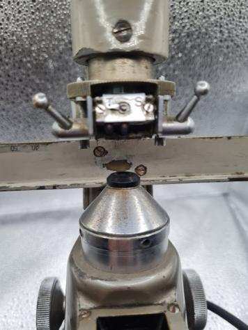 Microscopio Frontifocometro manuale