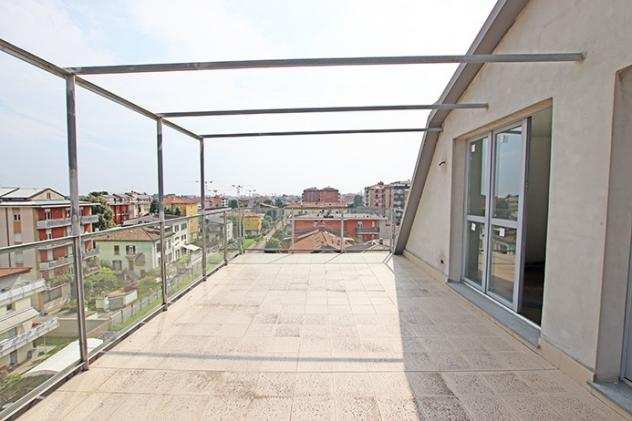 Moderni e pregevoli attici con terrazza in edificio di nuova costruzione in classe A