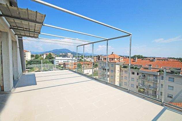 Moderni e pregevoli attici con terrazza in edificio di nuova costruzione in classe A