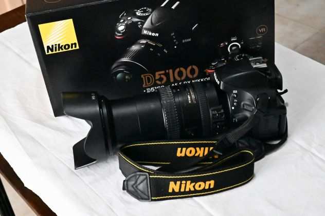 Nikon D5100 con obiettivo 18-200 3.5-5.6