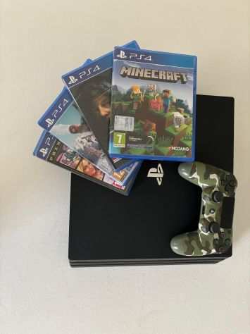 PlayStation 4 PRO con joystick originale e giochi