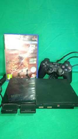 PS2 console piugrave due giochi.
