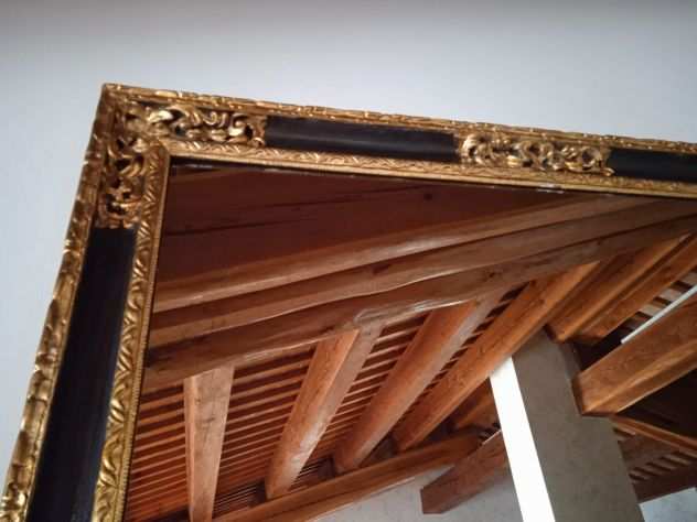 Specchiera in legno e oro del 1700.