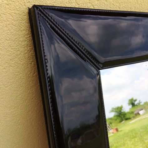 Specchio cornice in pelle nera lucida