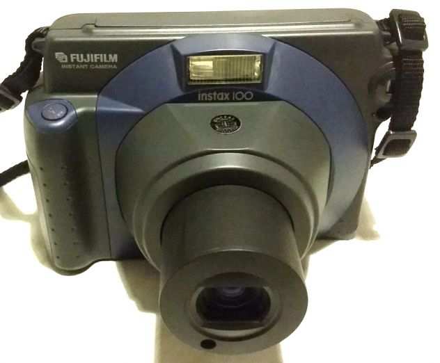 Splendida Polaroid Fujifilm Instax 100 testata nuova anno 1999