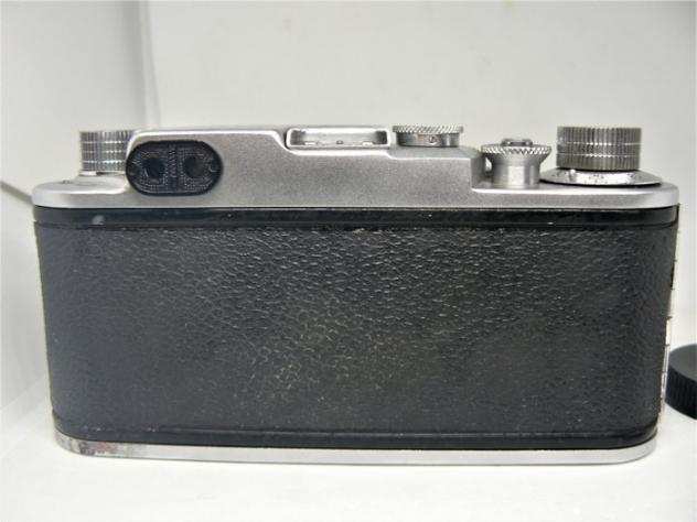 Tanacka Optik Tanack IV-S, with Tanar 2.850mm lens. Japan 1955.