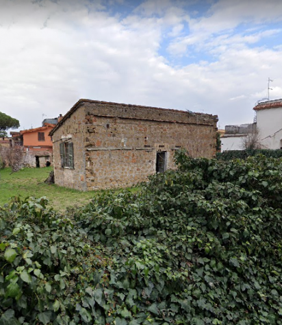 Terreno con casa condonata