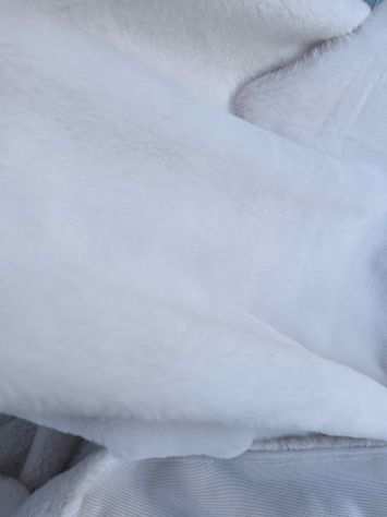 Tessuto eco pelliccia colore bianco