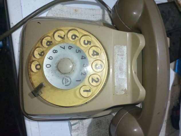 Vendo telefono anni 80, grigio con rotella per comporre i numeri